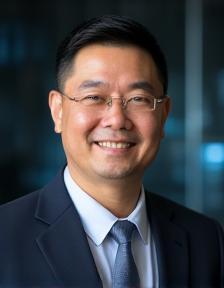 Headshot of Jian Zhao, Senior Cybersecurity Analyst at Apex Business Solutions.